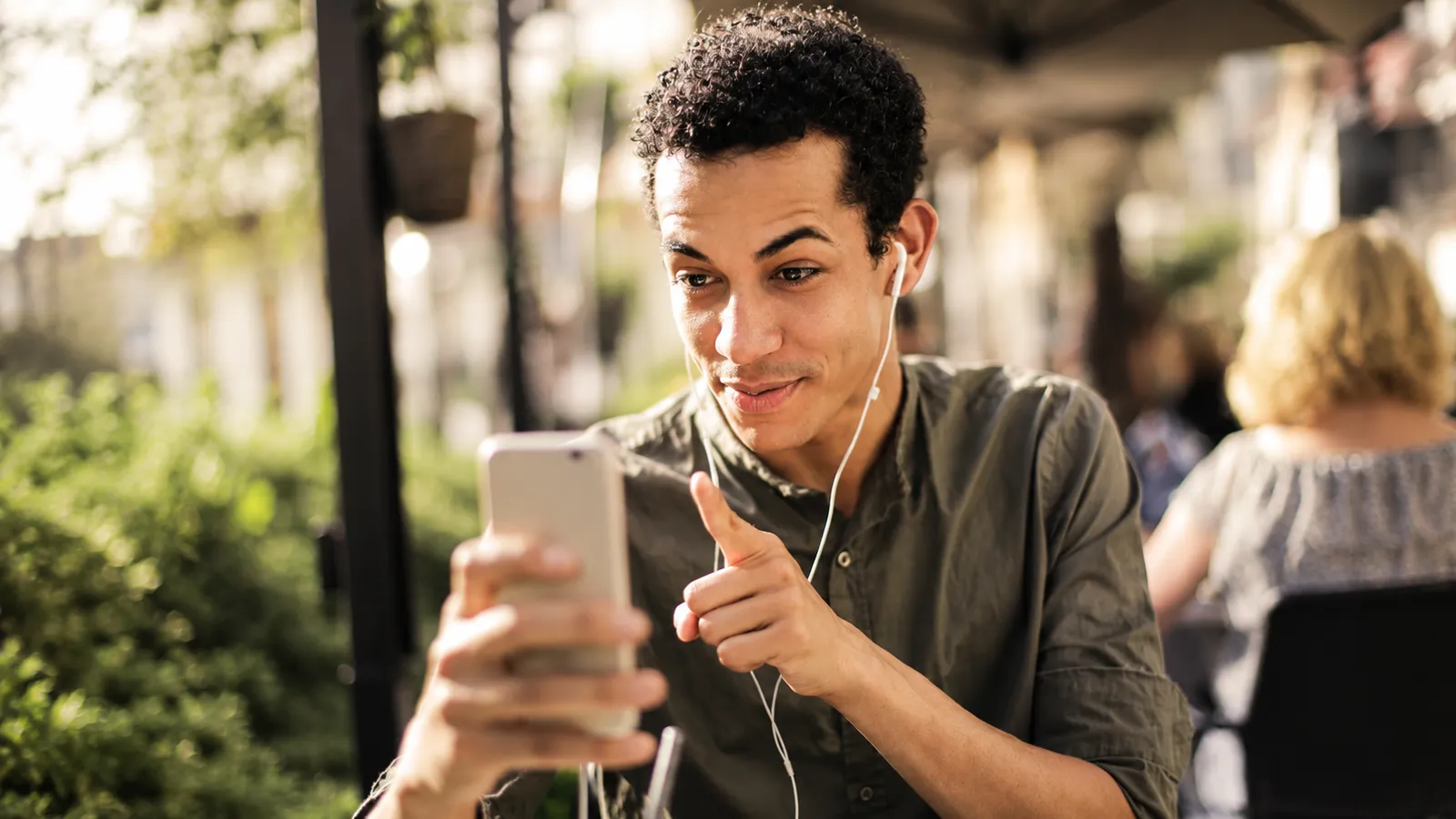 Young man reacting thoughtfully during a video conversation, illustrating changing perceptions of communication in modern relationships.
